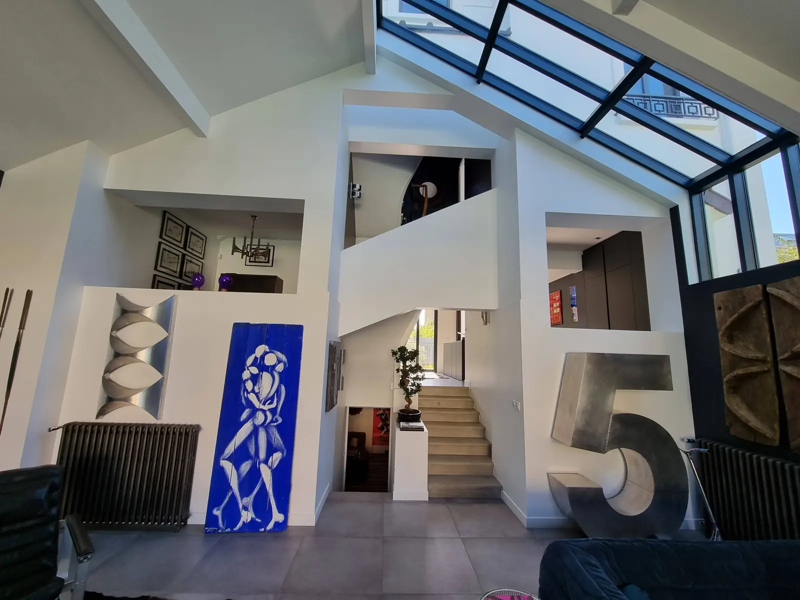 Intérieur avec verrière d'une maison transformée par DSA à Colombes — DSA Architectes